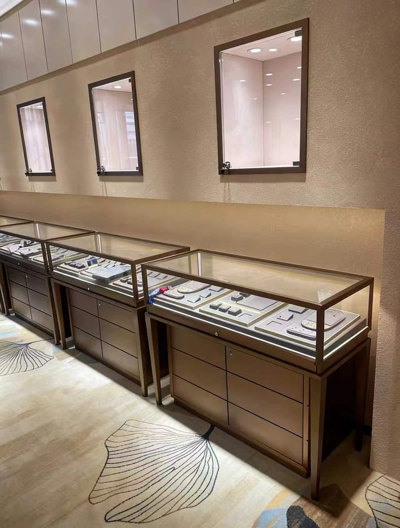 Wall jewelry counters with illuminated display niches