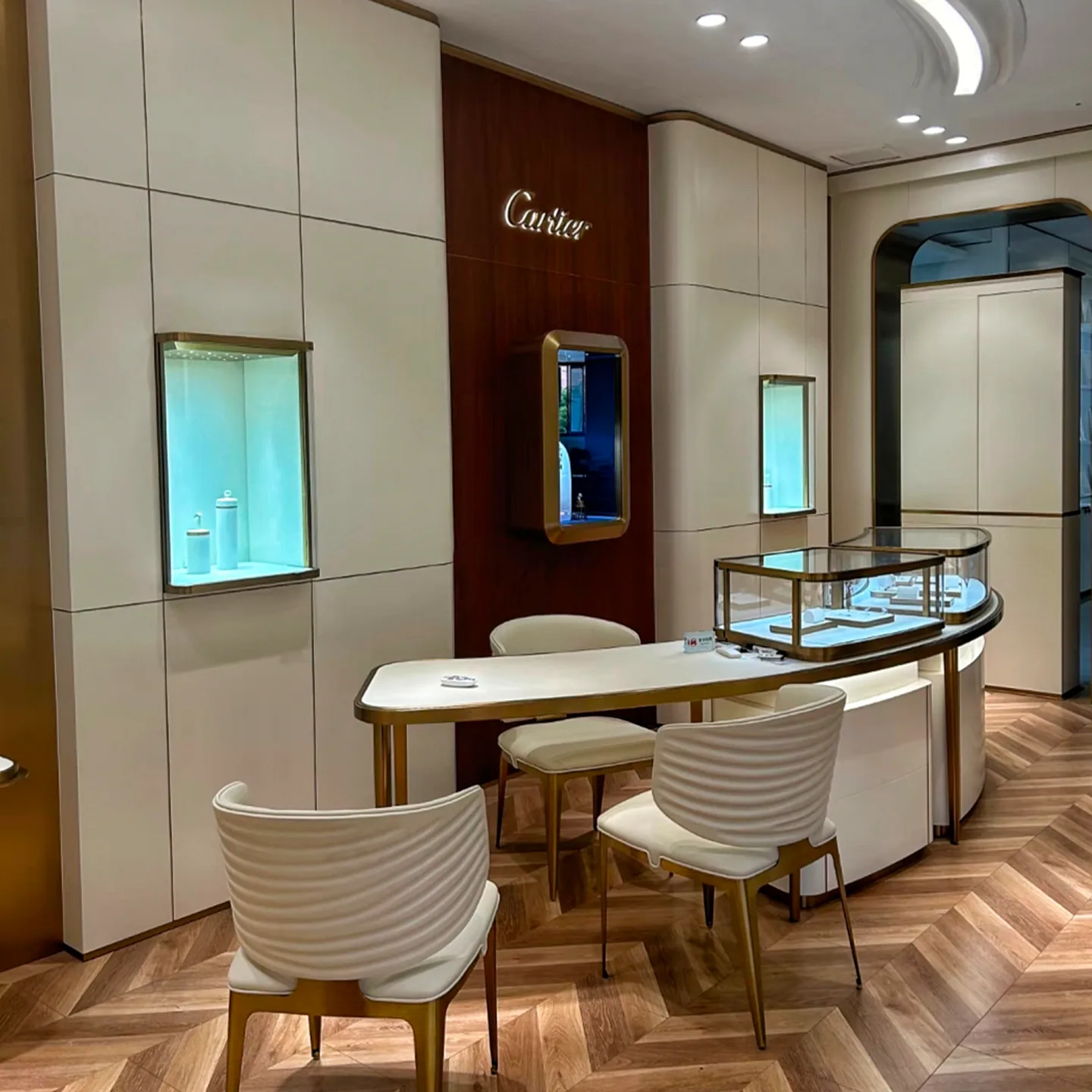 Luxury jewelry store consultation area and showcases
